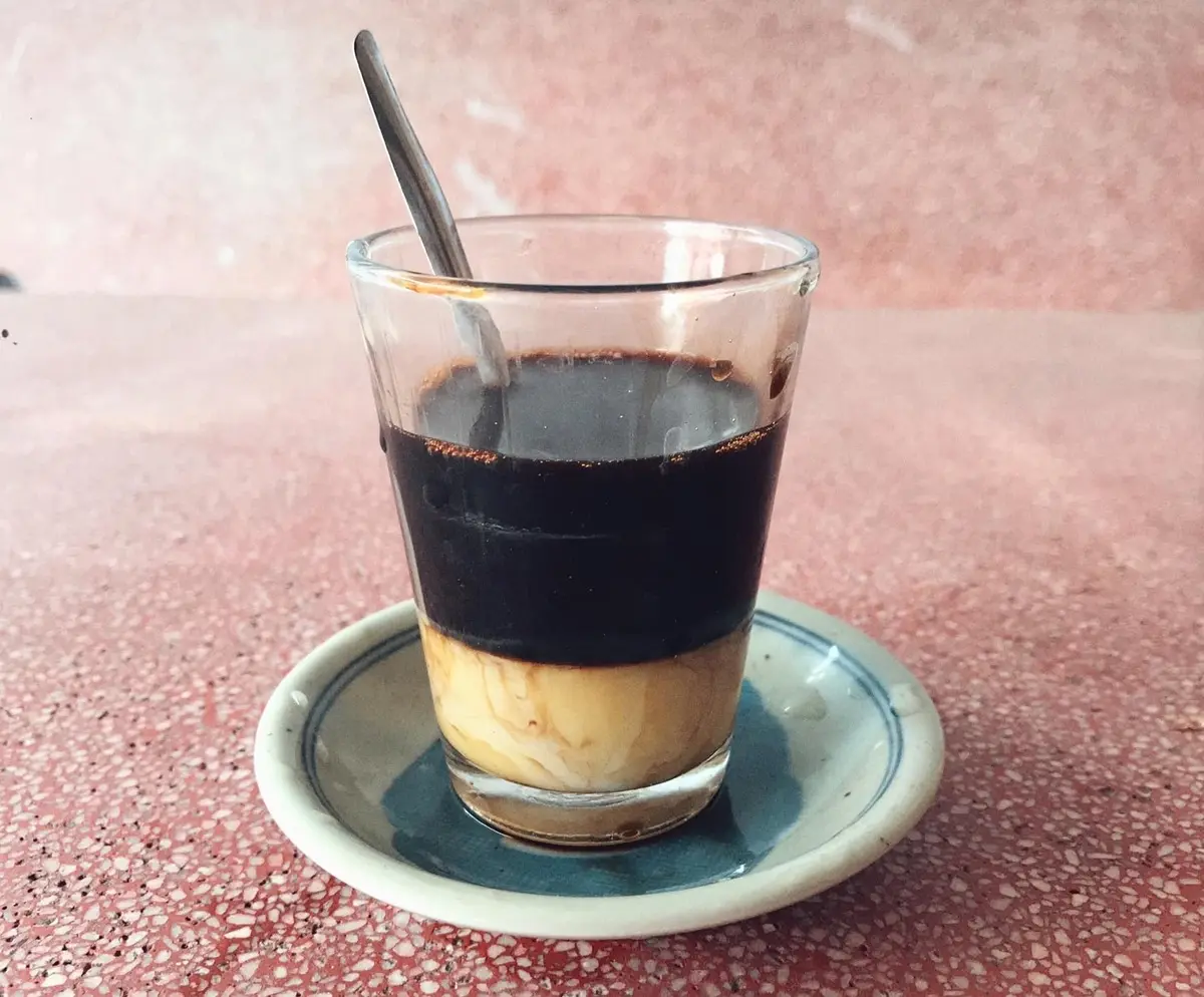 Thưởng thức c&agrave; ph&ecirc; vợt C&ocirc; 2 Thanh (Chợ Mới) hơn 30 năm tuổi 6