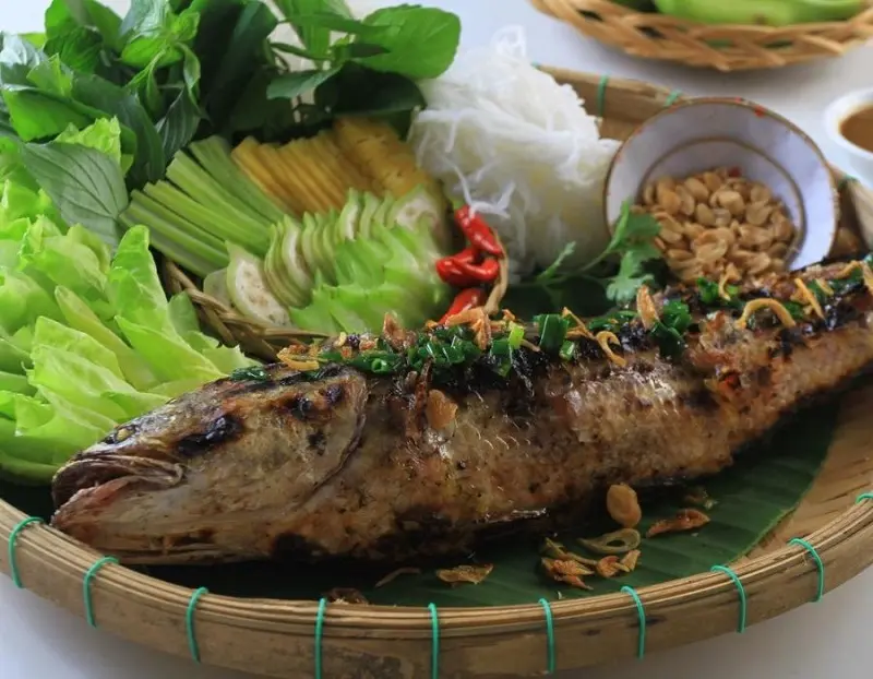 Cá lóc nướng trui Cà Mau và những điều có thể bạn chưa biết