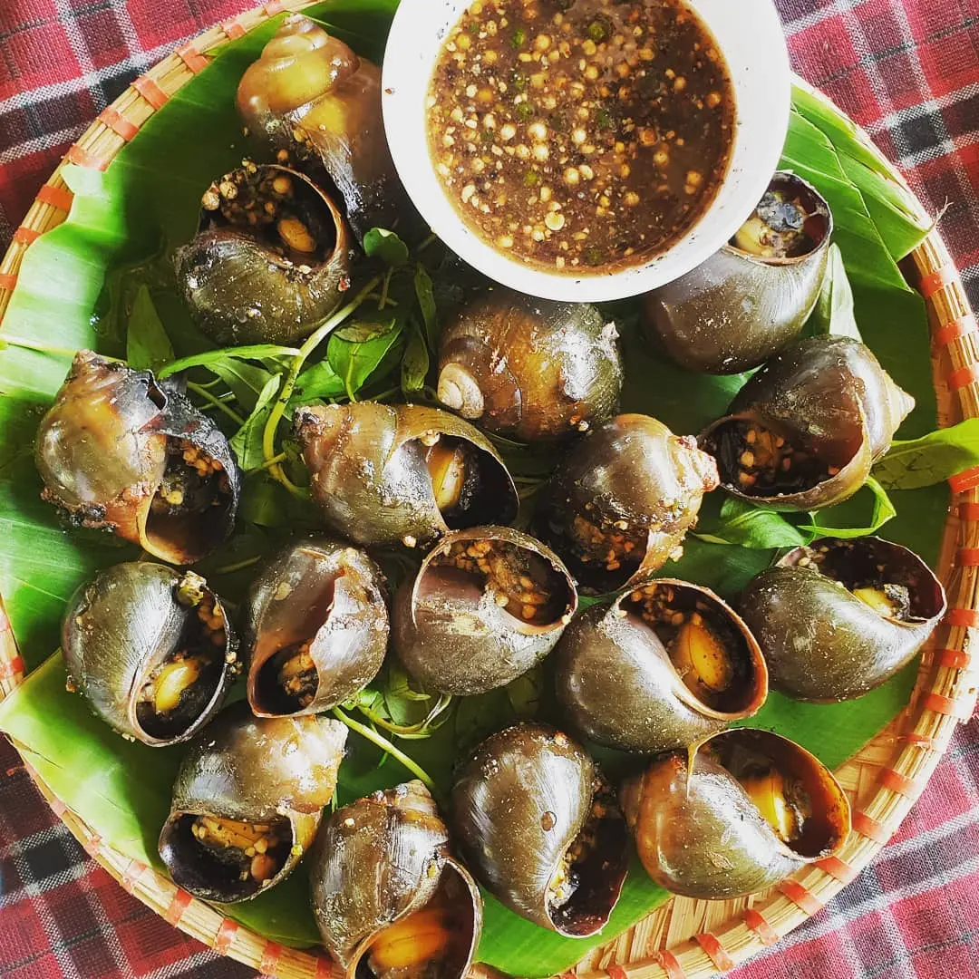 Khám phá đặc sản Ốc bươu nướng tiêu xanh Cần Thơ cực thơm ngon 5