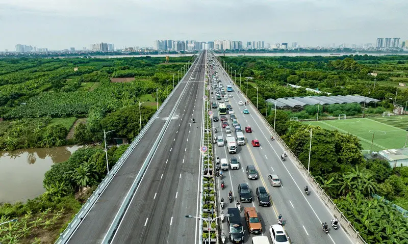 Kh&aacute;m ph&aacute; vẻ đẹp rực rỡ về đ&ecirc;m của cầu Vĩnh Tuy 5