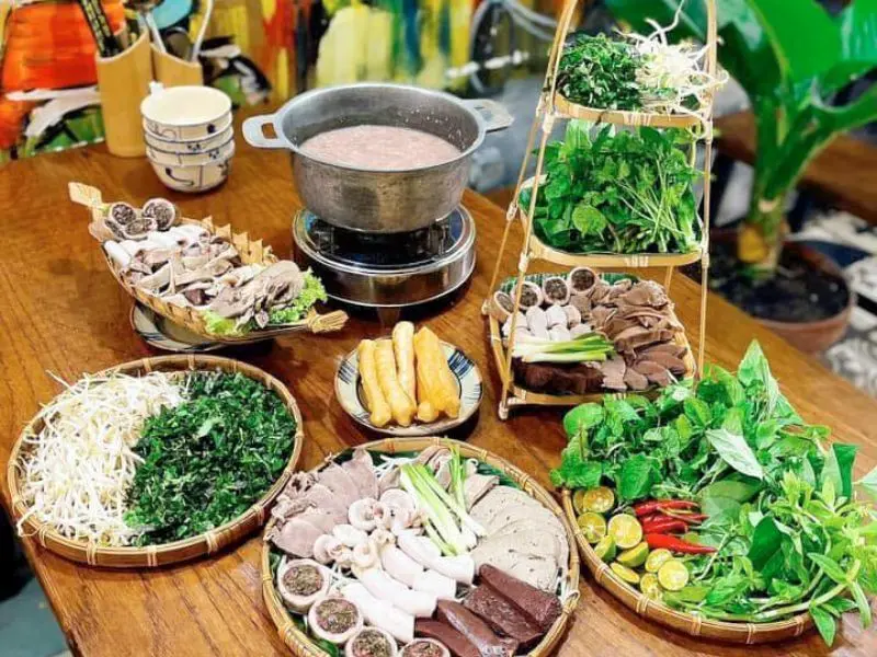 12 địa điểm thưởng thức lẩu ch&aacute;o H&agrave; Nội thơm ngon nức tiếng 8