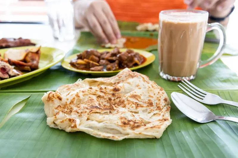 Roti Canai: M&oacute;n b&aacute;nh thơm dậy m&ugrave;i bơ nức tiếng Malaysia 3