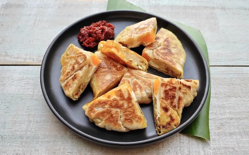Roti Canai: M&oacute;n b&aacute;nh thơm dậy m&ugrave;i bơ nức tiếng Malaysia 4