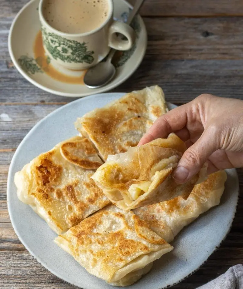 Roti Canai: M&oacute;n b&aacute;nh thơm dậy m&ugrave;i bơ nức tiếng Malaysia 5