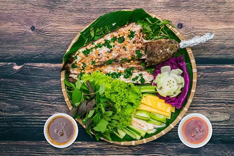 C&aacute; l&oacute;c nướng trui Tiền Giang, m&oacute;n ăn b&igrave;nh dị của v&ugrave;ng s&ocirc;ng nước 5